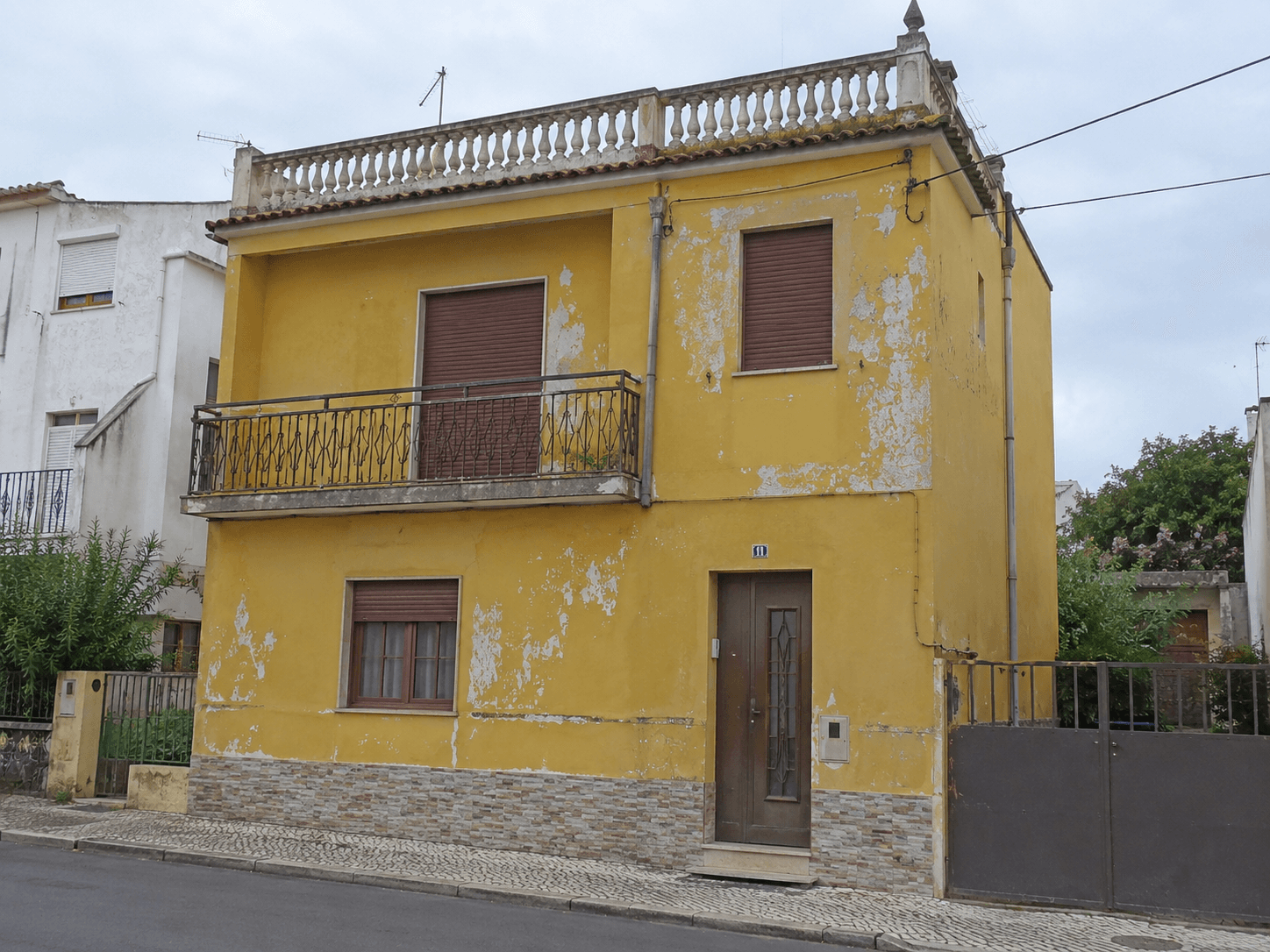 Pintura de interiores e fachadas, com acabamento limpo e duradouro, fotografia da intervenção